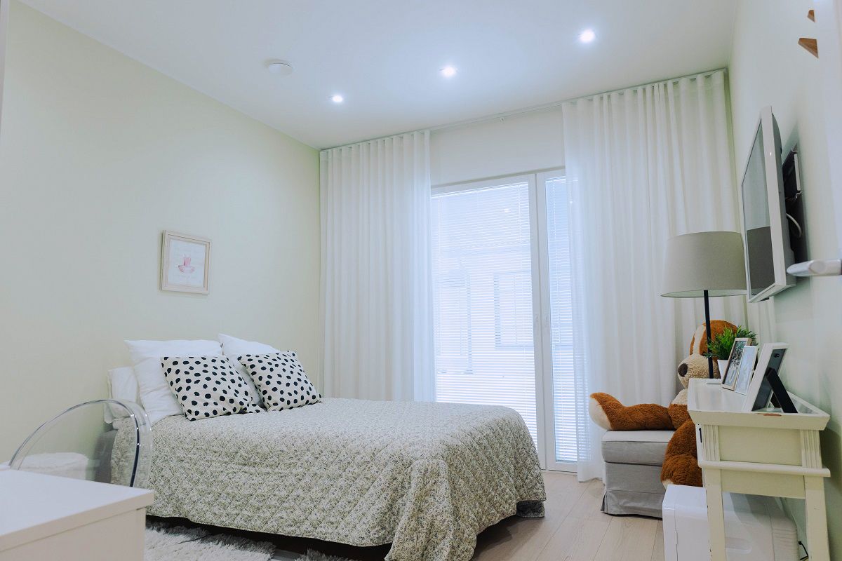 KANTTI 023W 9W in a bedroom with cool light tone.